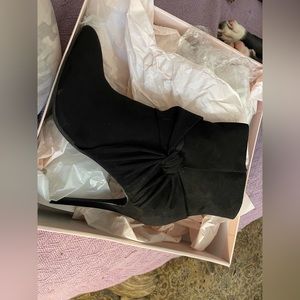 Black Short boots (booties) with heels.  Size 11.  Never worn